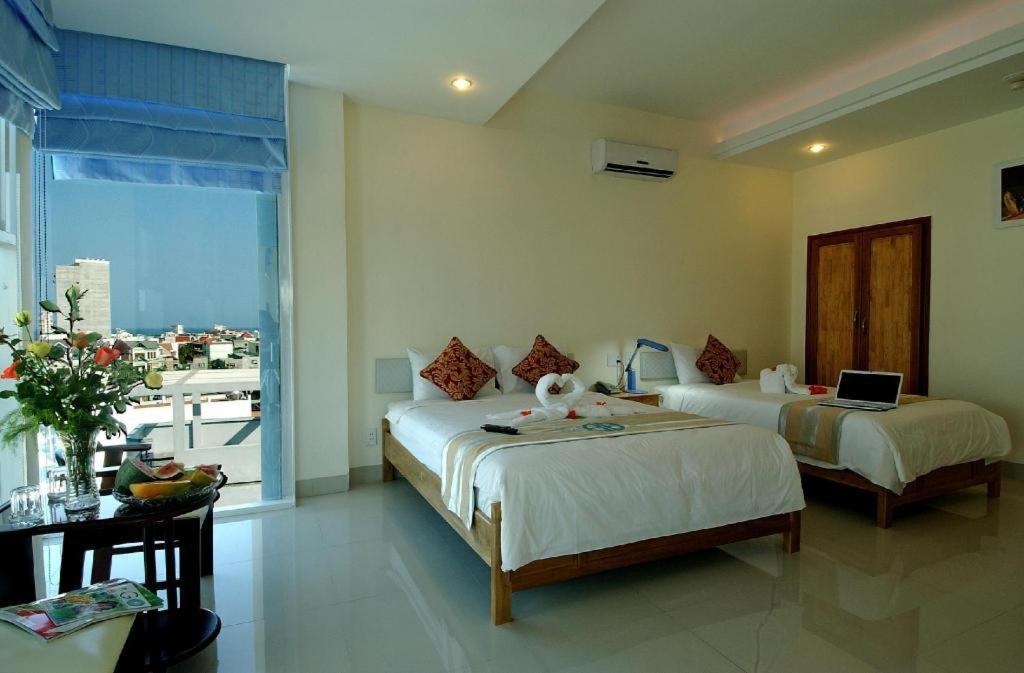 Blue Beach Hotel Danang Bagian luar foto